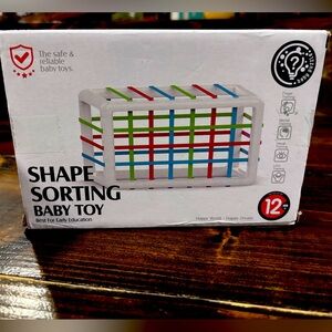Baby/toddler shape sorting toy. 
Brand new in box.